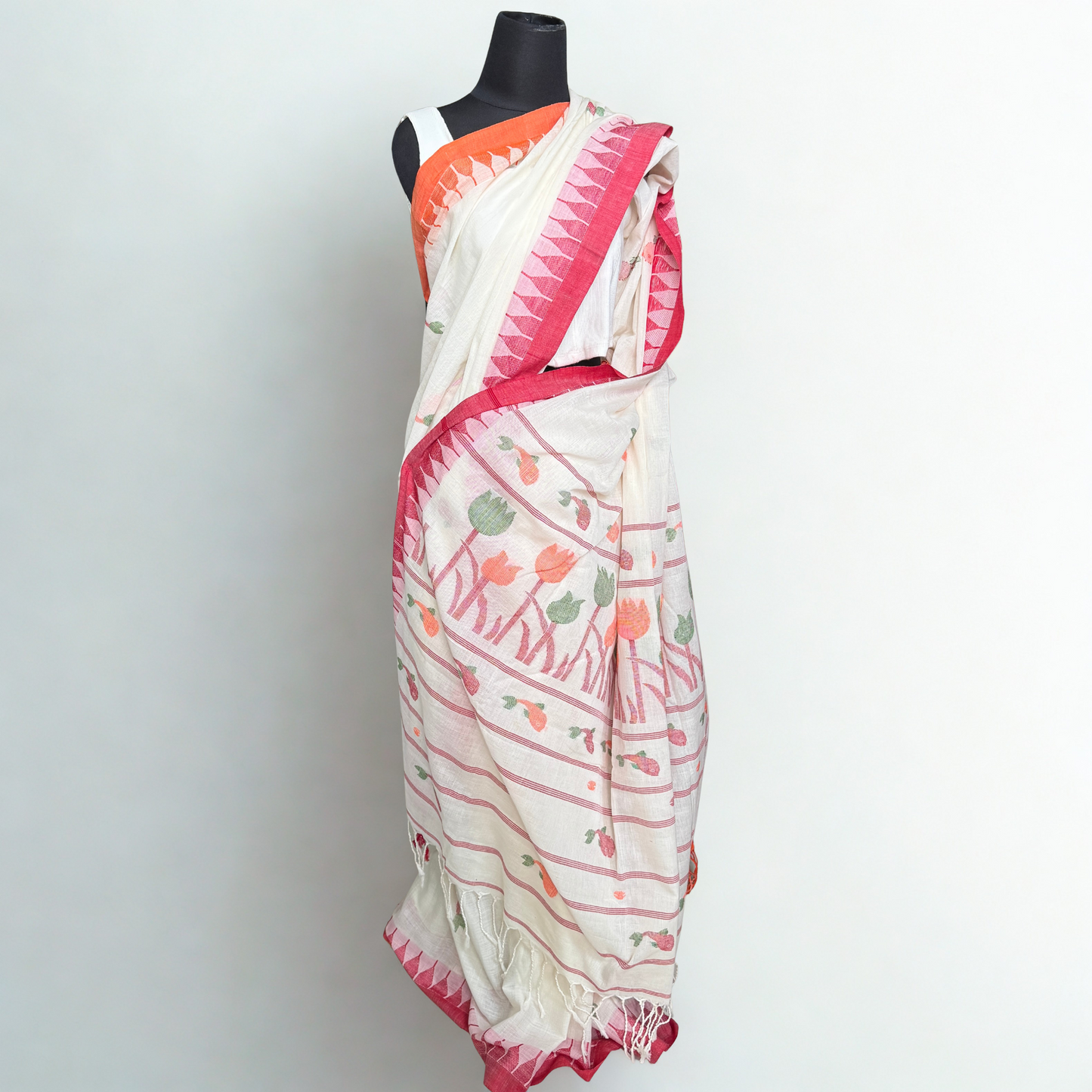 Whispering Tulips: White Cotton Handloom Saree with Moirangphee Motifs