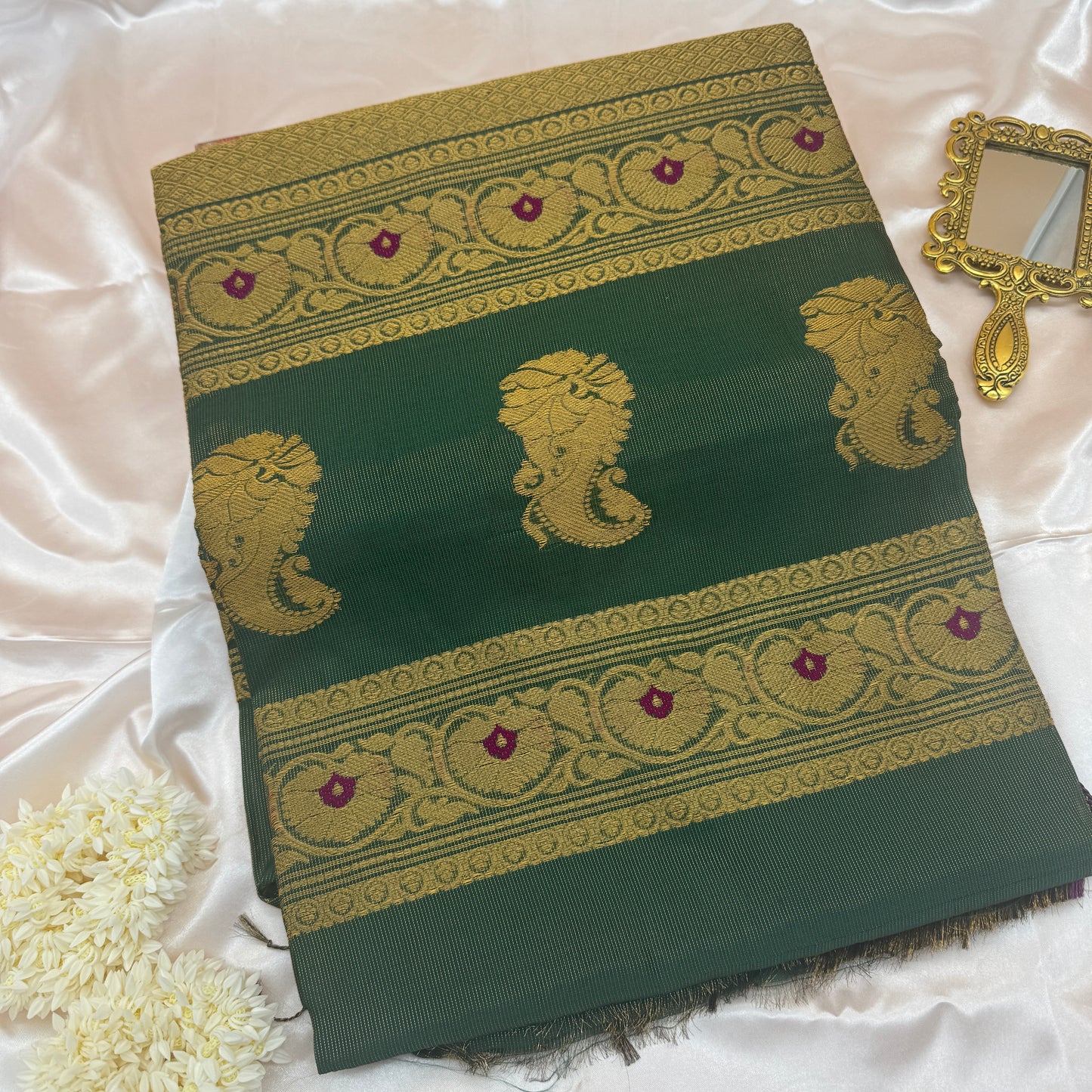 Harit Kanika: Green Muslin Tissue Silk Saree