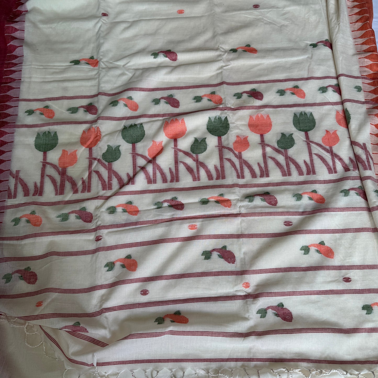 Whispering Tulips: White Cotton Handloom Saree with Moirangphee Motifs