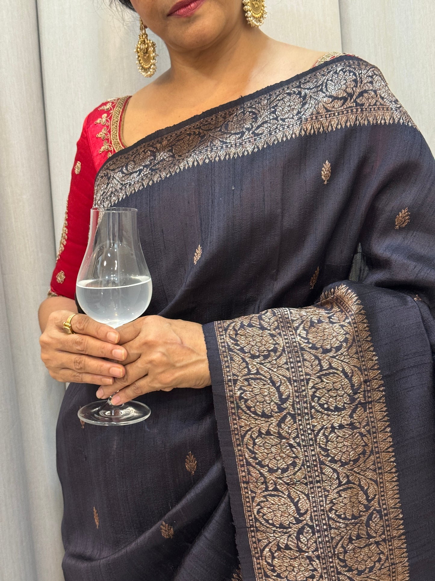 Ragini: Black Silk Saree with Contrast Red Blouse