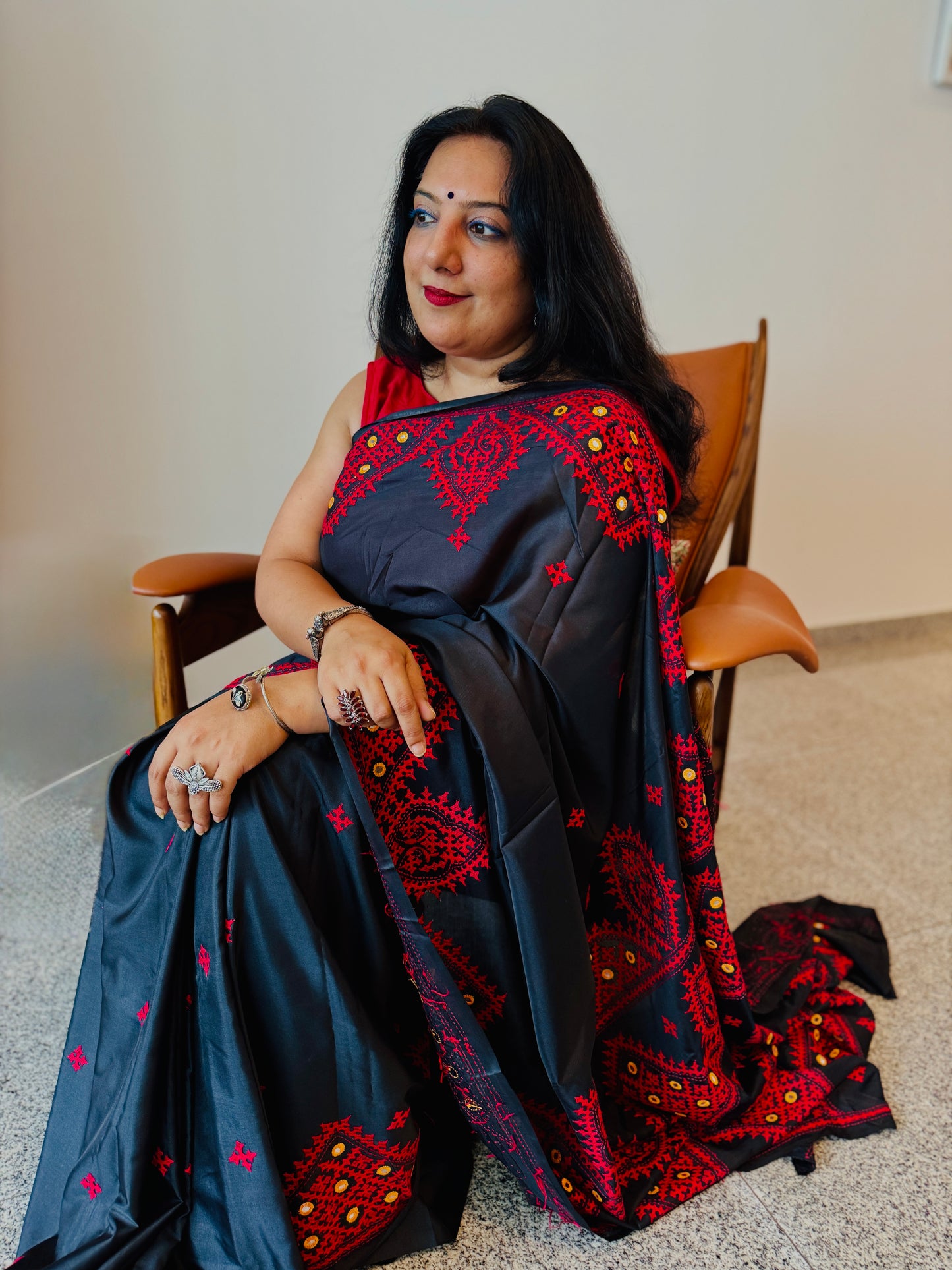Geetanjali: Black Semi-Silk Saree with Red Kuchchi embroidery