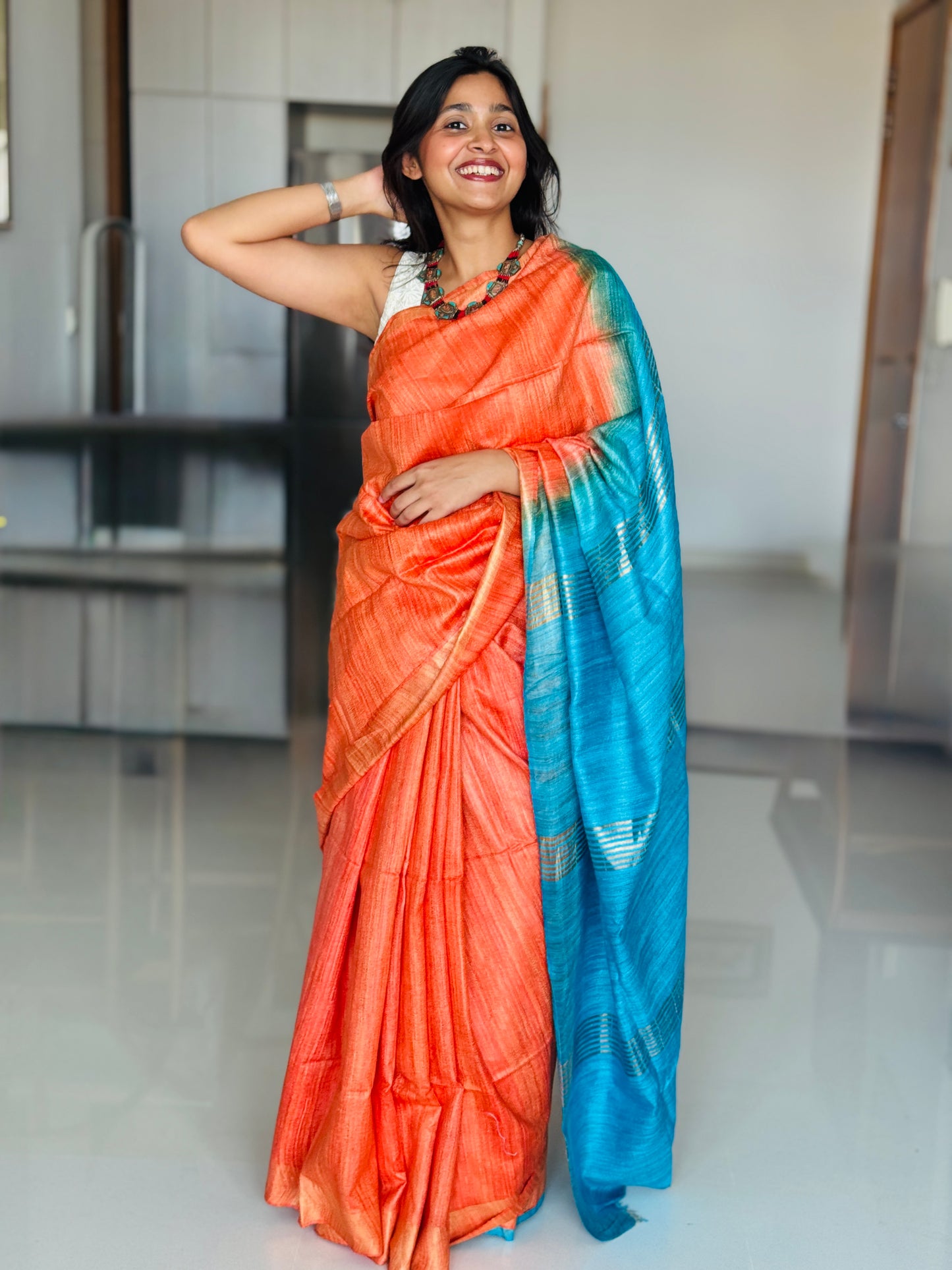 Azure: Orange and Blue Ghicha Silk Saree