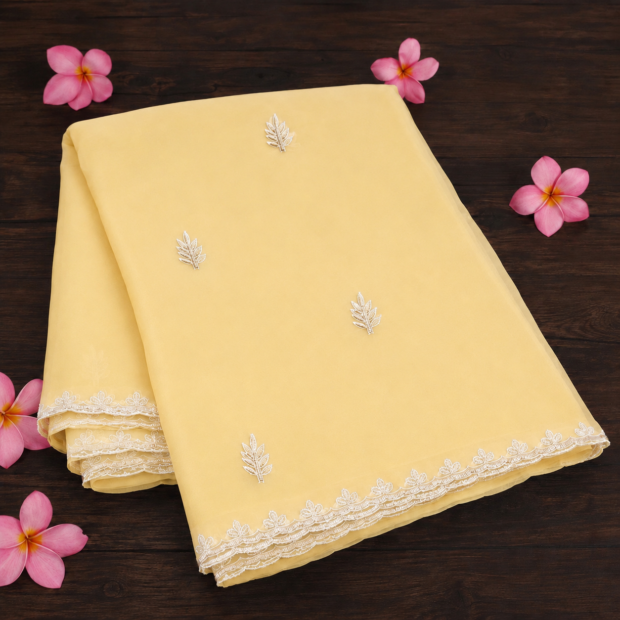 Archana: Yellow Chiffon saree with sequins