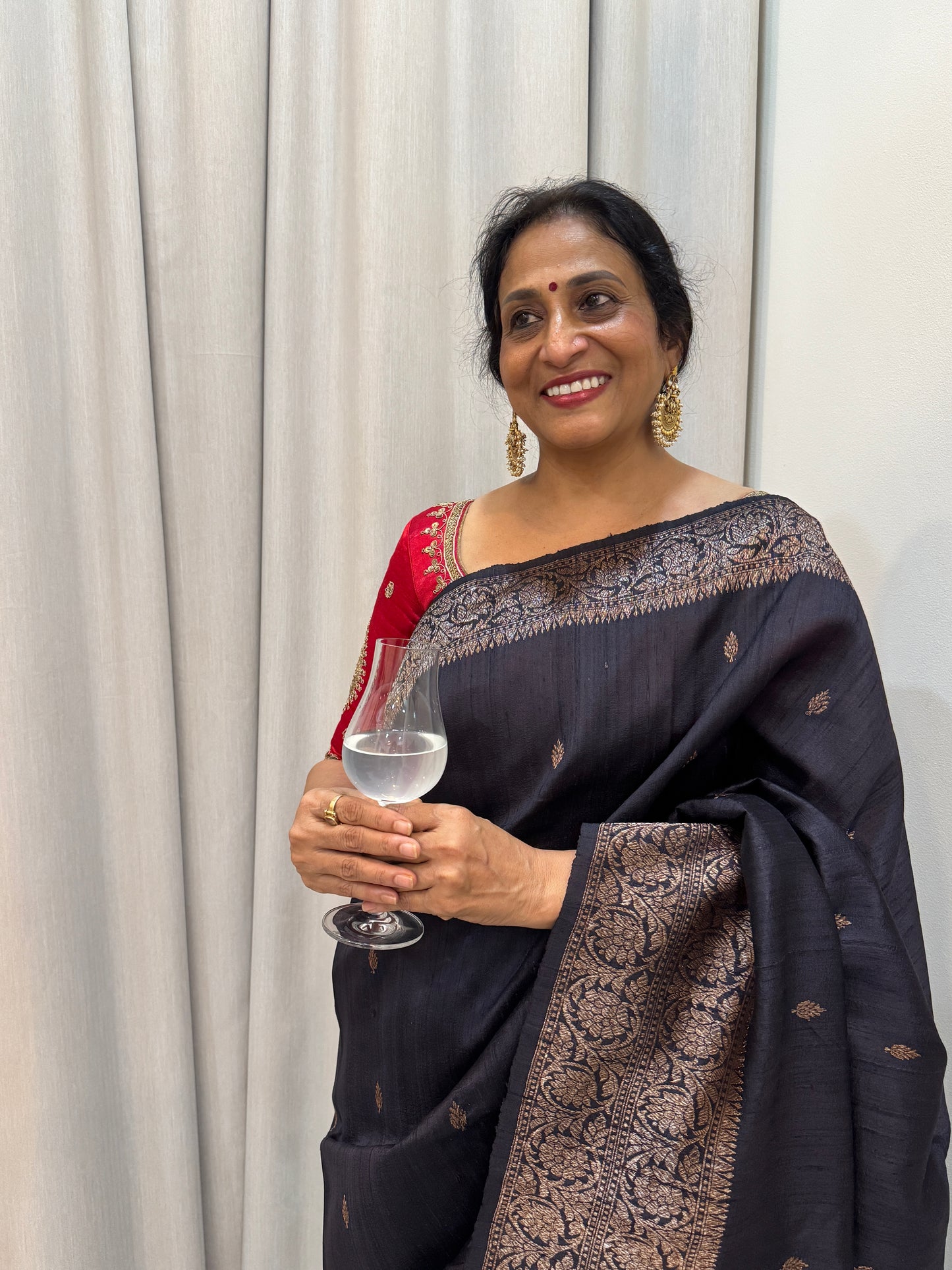 Ragini: Black Silk Saree with Contrast Red Blouse