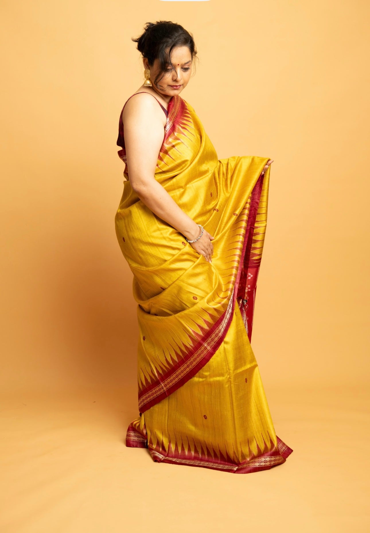 Aruni: Yellow Sambalpuri Ikkat  Tussar Silk Saree