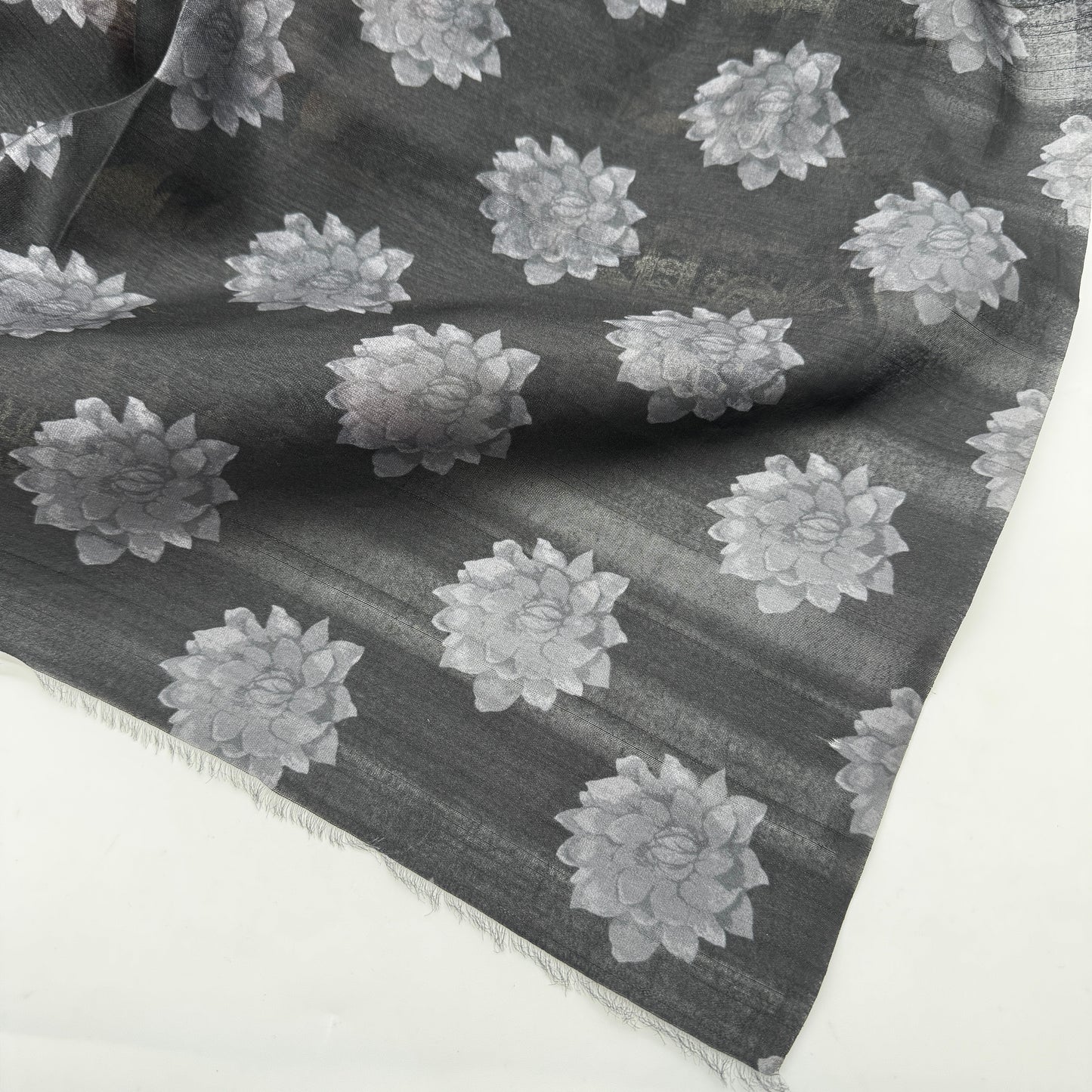 Nishika: Black Floral Semi-Silk Saree