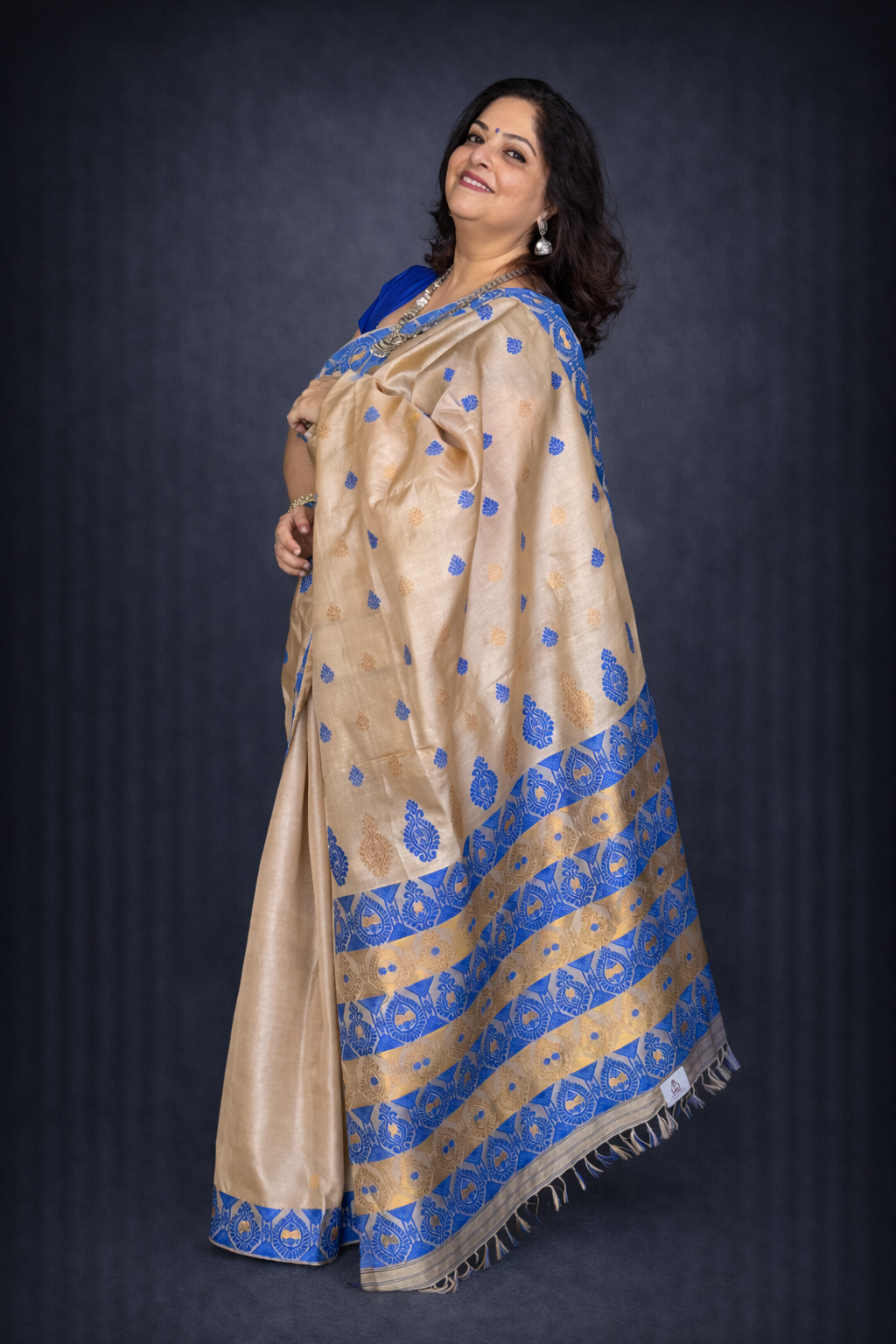 Sona: Beige and Blue Assam Handwoven Tussar Silk Saree