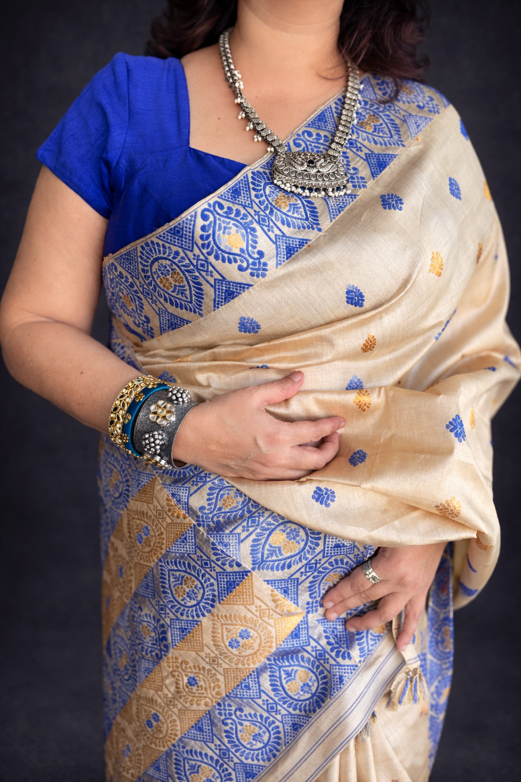 Sona: Beige and Blue Assam Handwoven Tussar Silk Saree