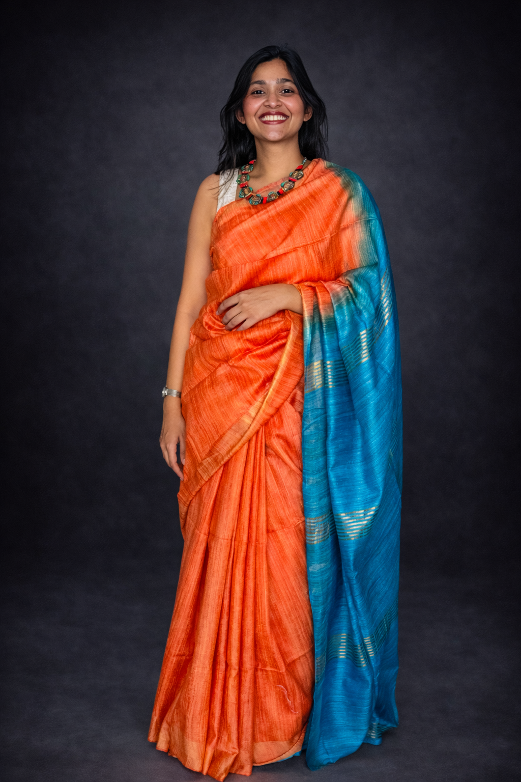 Azure: Orange and Blue Ghicha Silk Saree