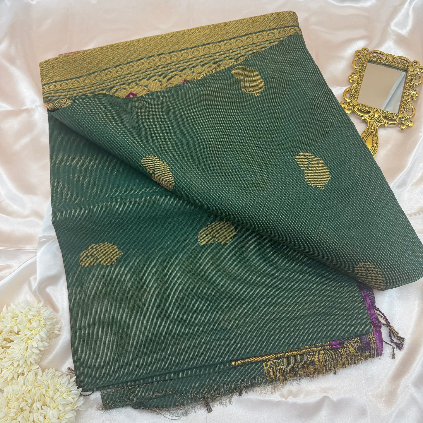 Harit Kanika: Green Muslin Tissue Silk Saree