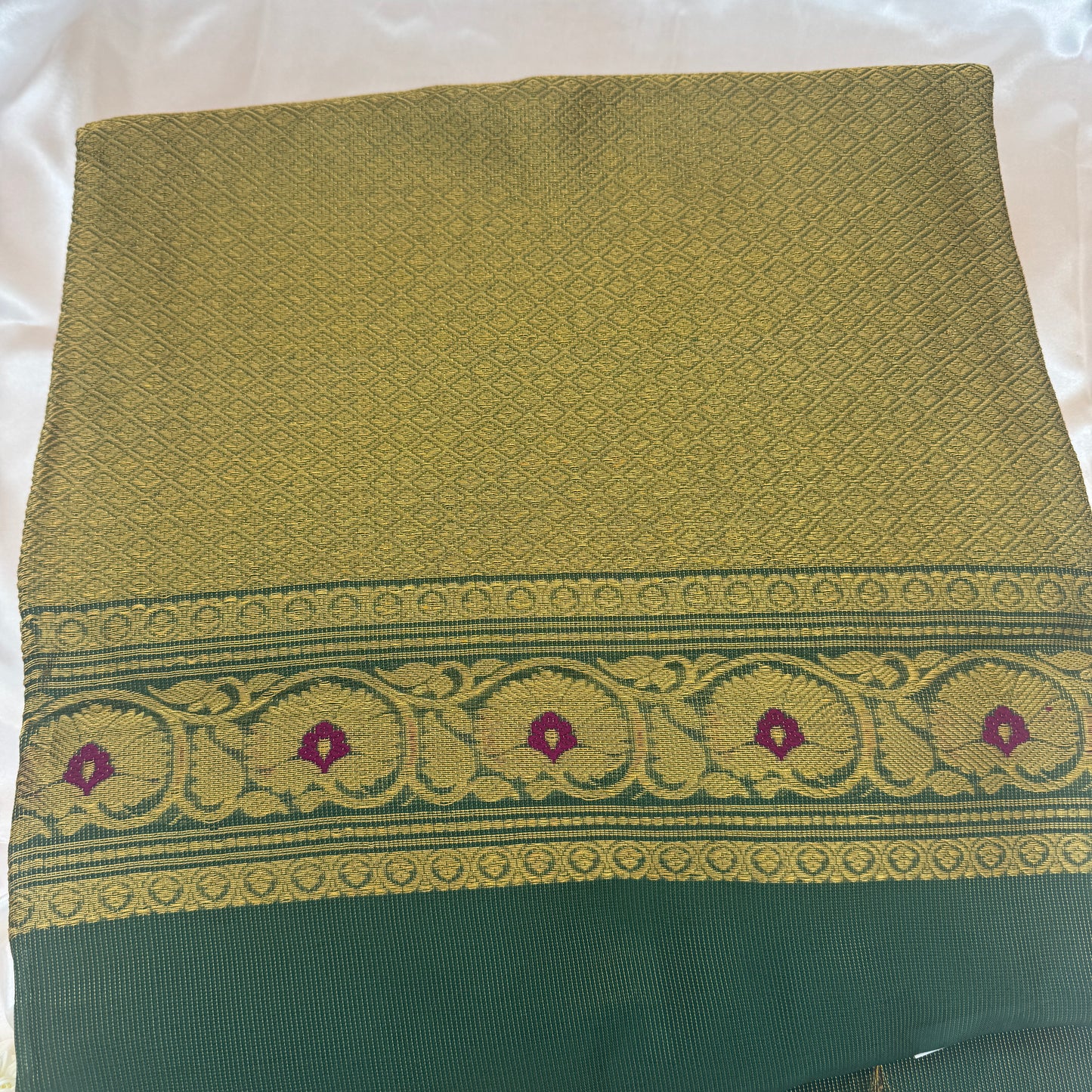 Harit Kanika: Green Muslin Tissue Silk Saree