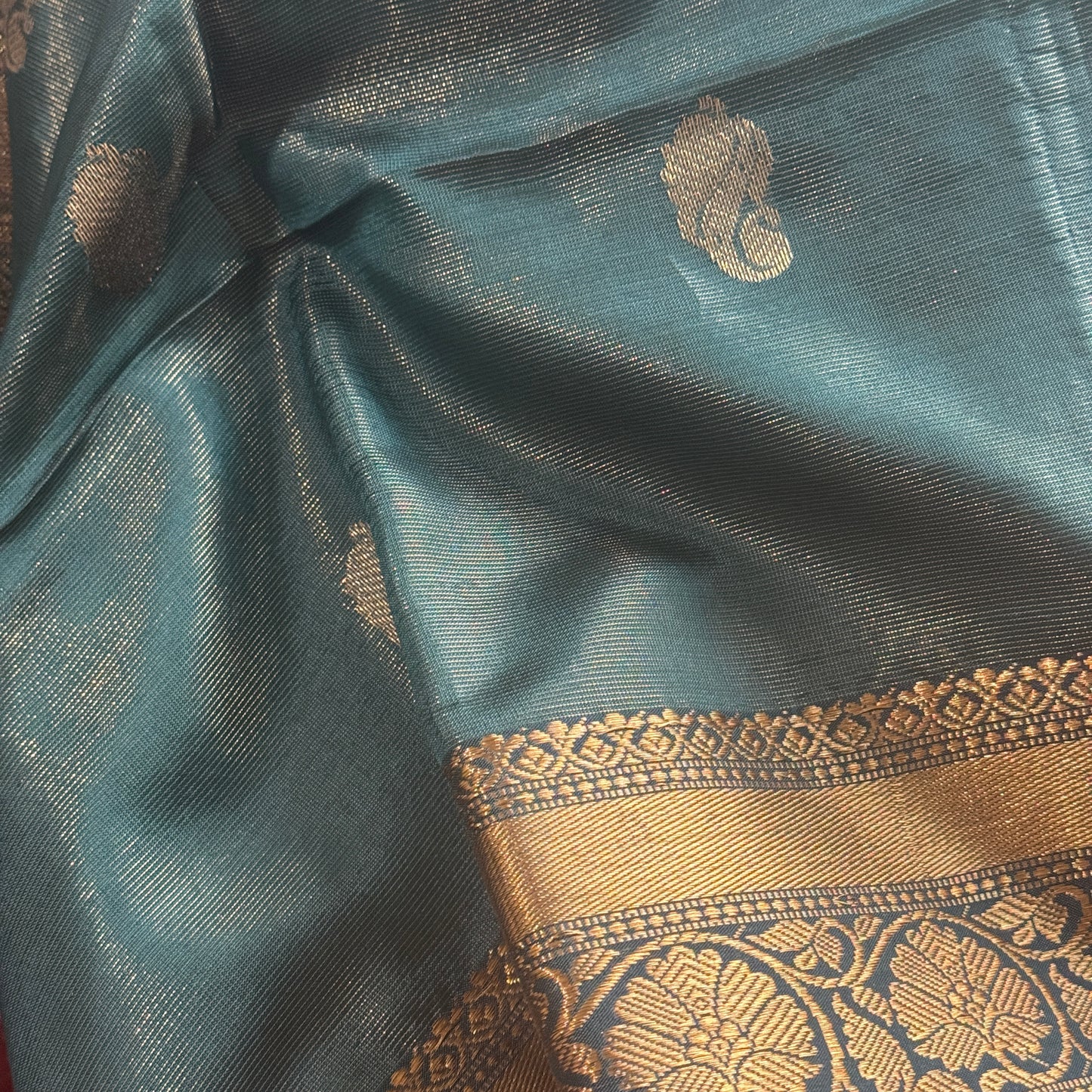 Harit Kanika: Green Muslin Tissue Silk Saree