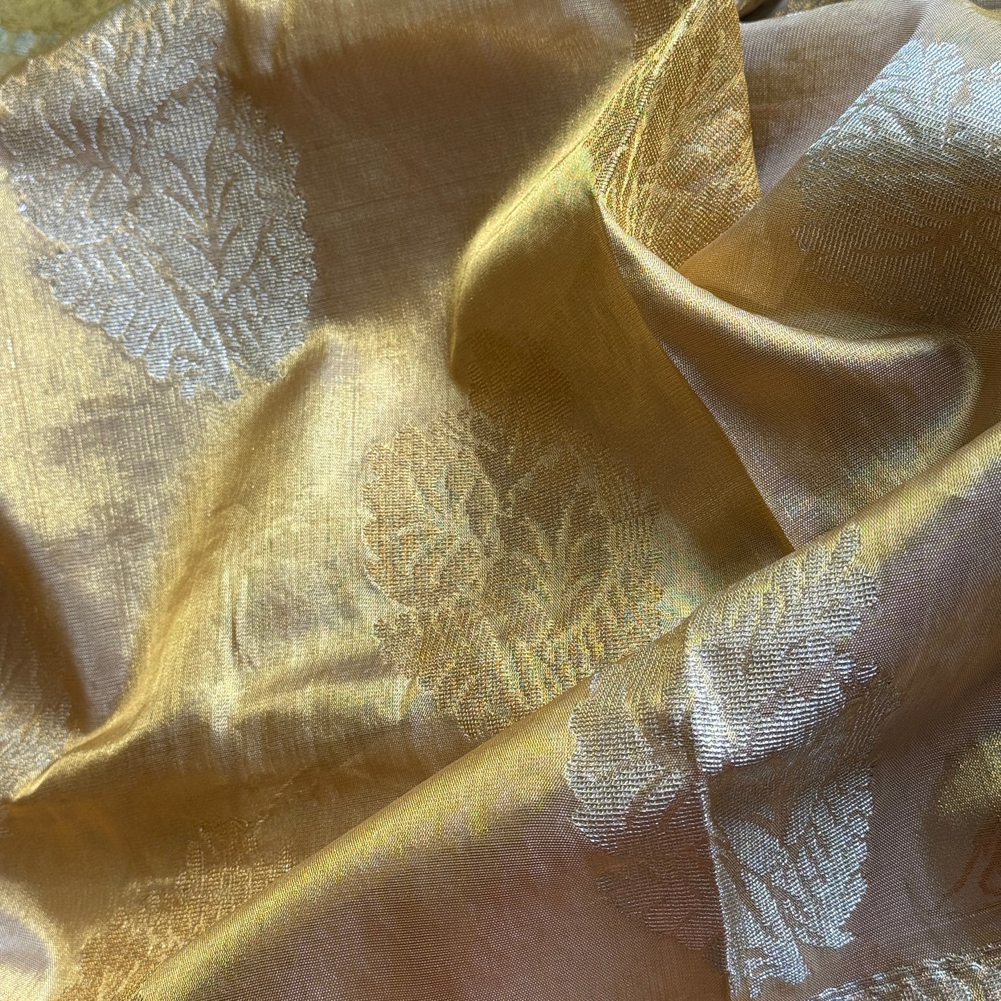 Svarnarekha: Golden Tissue Silk Saree with Antique Leaf Motifs