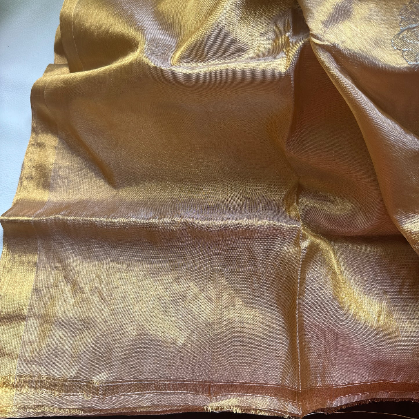 Svarnarekha: Golden Tissue Silk Saree with Antique Leaf Motifs