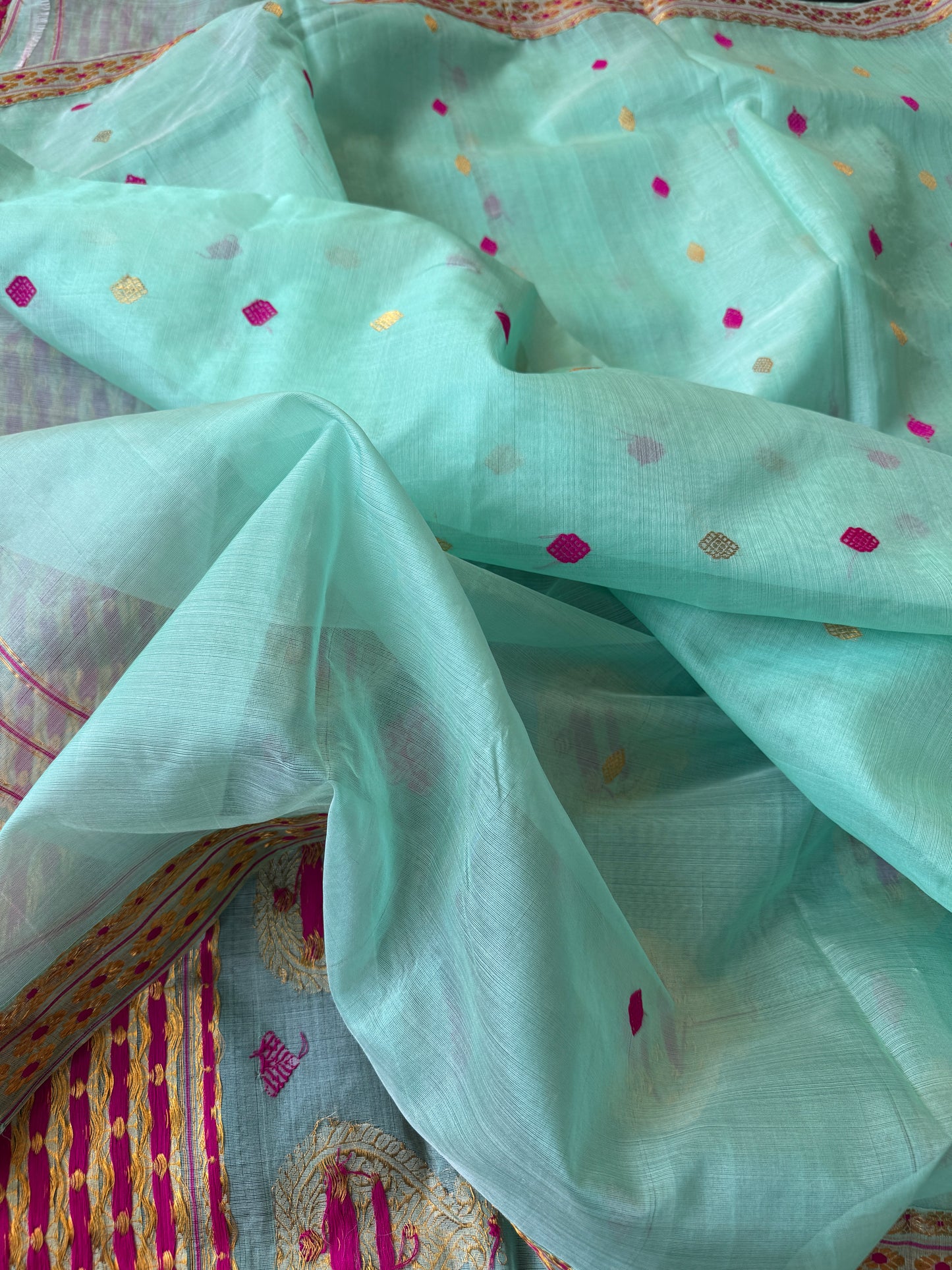Monor Kuwori: Green Kesapaat Silk Saree